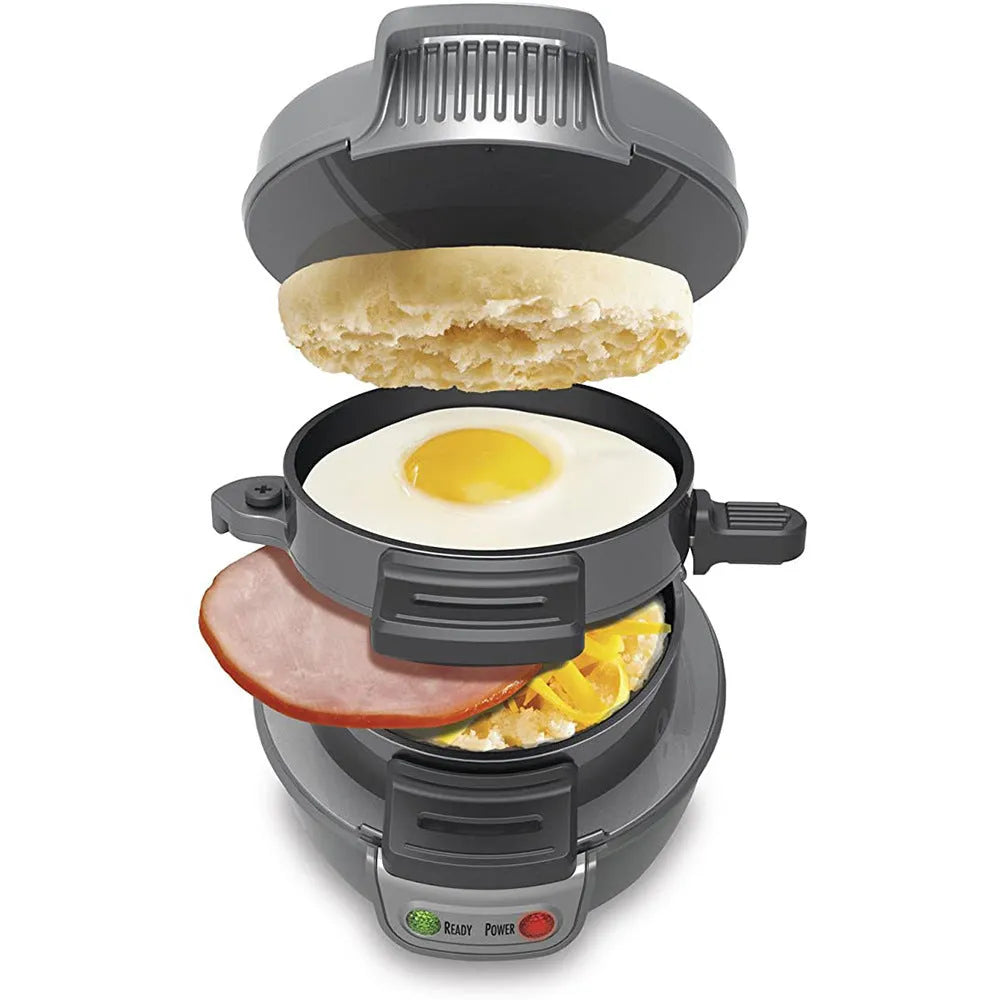 Bright red breakfast sandwich maker with egg cooker ring and two non-stick baking trays