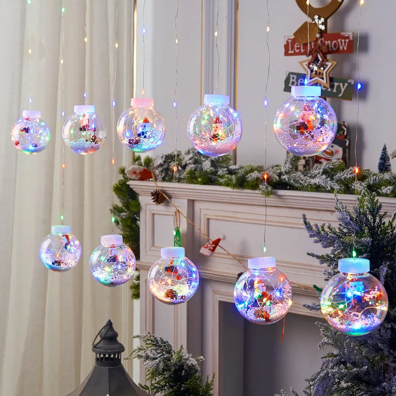 LED Christmas curtain light string with 10 decorative PVC lamp balls showing fairy, snowman, and wishing ball designs.