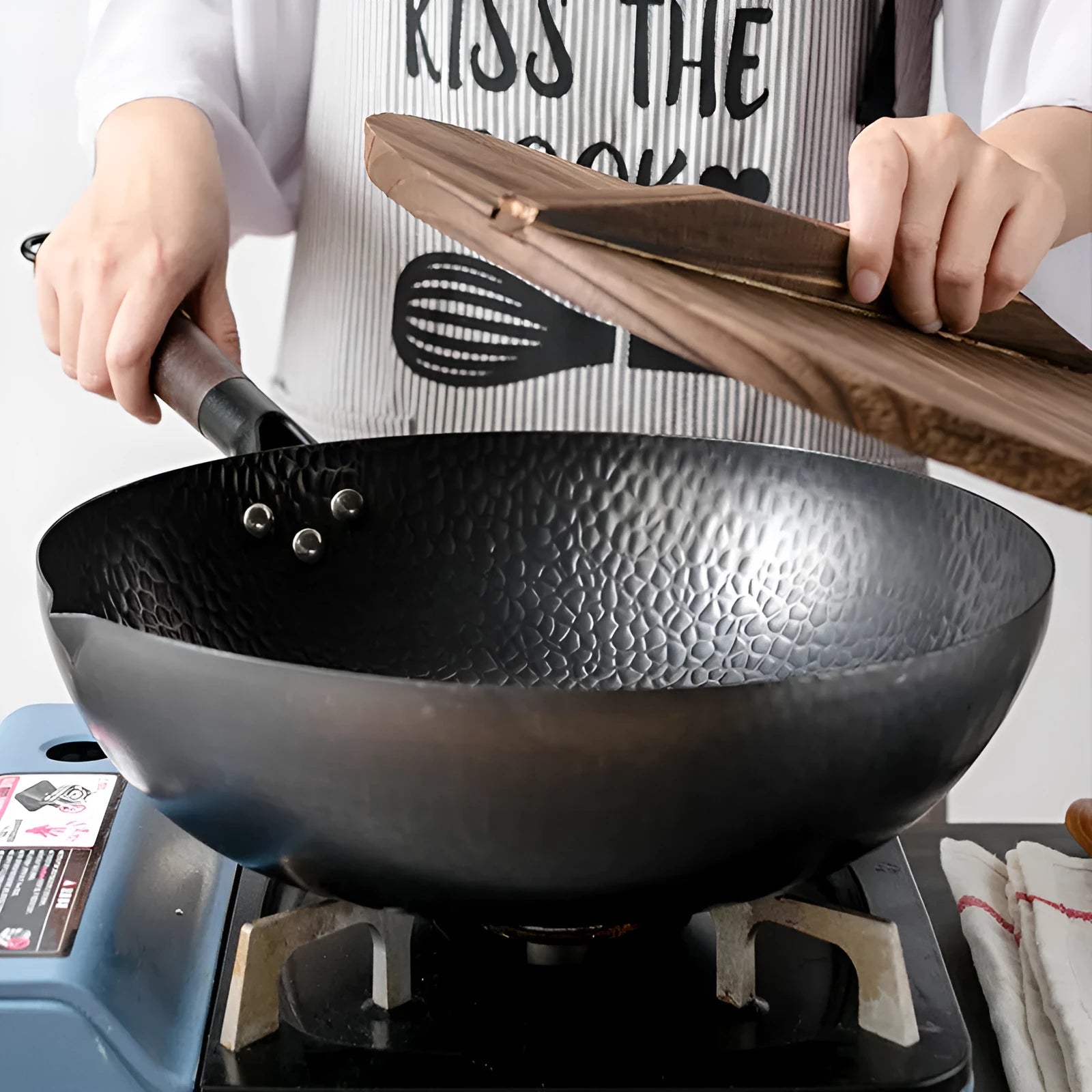 Traditional black iron wok pan with wooden handle measuring 40cm