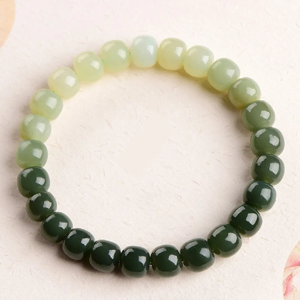Natural Hetian jade bracelet with water gradient colour in polished finish