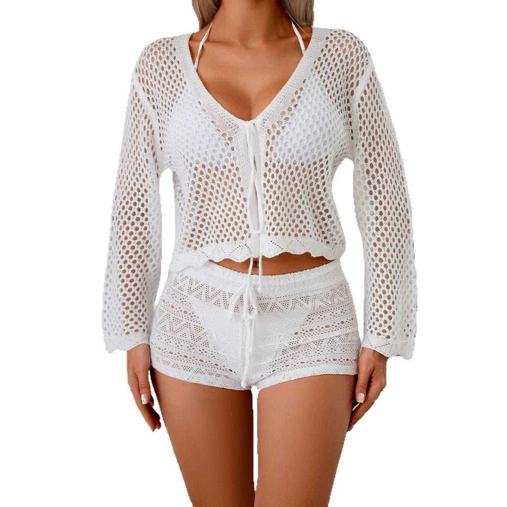 Short length women's cardigan blouse with bell sleeves in a choice of colours.