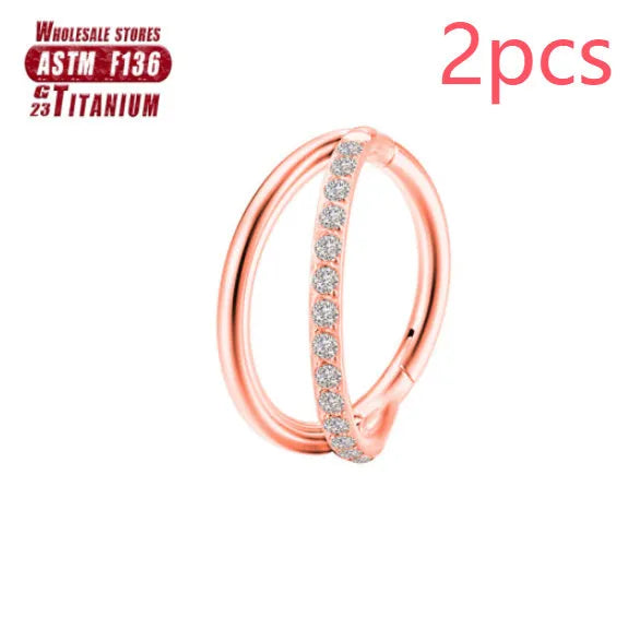 Titanium alloy nose ring in silver, available in plain or diamond-set styles and multiple lengths.