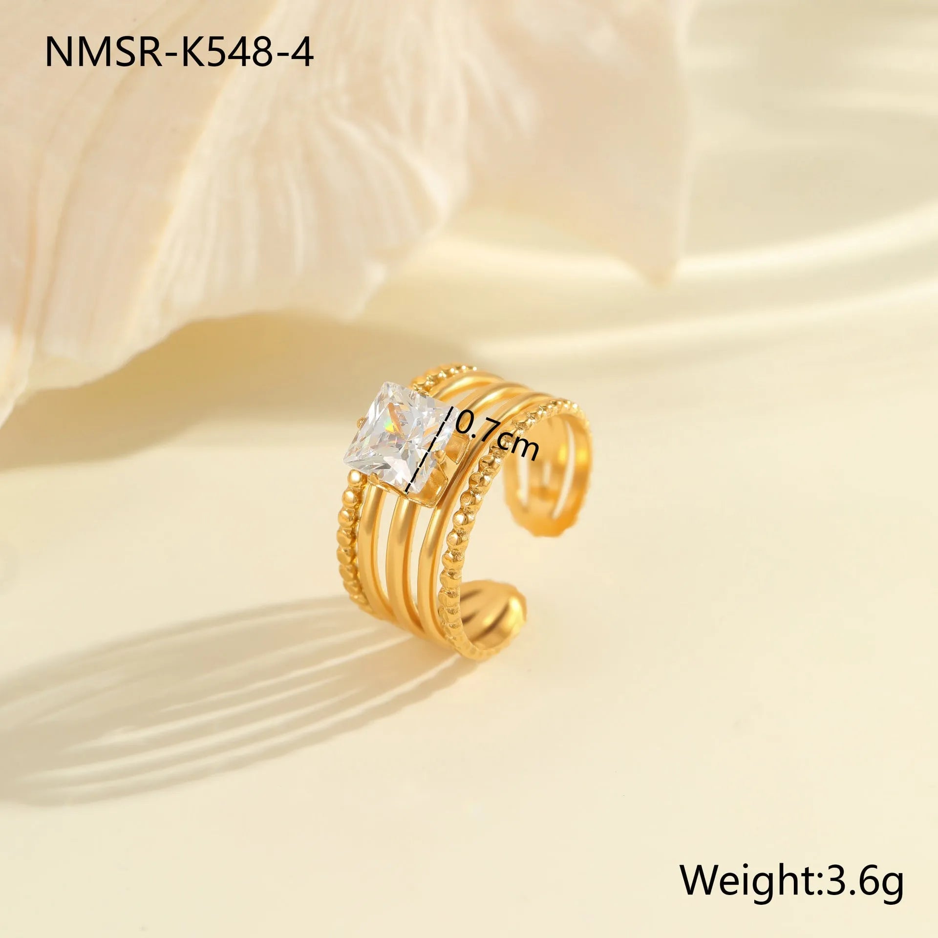 Open mouth geometric stainless steel ring with heart drop shape and gold inlaid zircon.