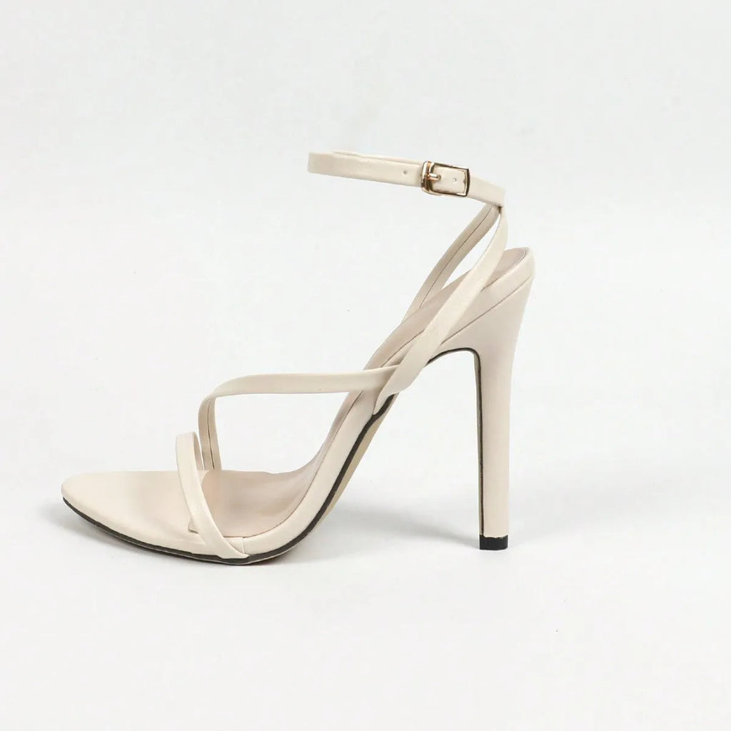 Women's gold high heels with round open toe and cross ankle strap design