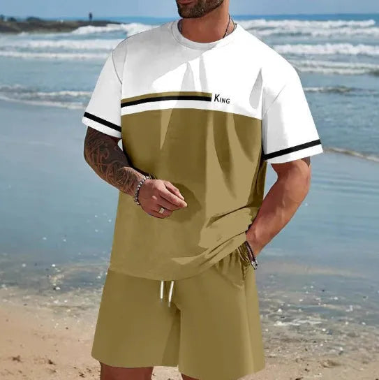 Man wearing a loose light blue short-sleeved T-shirt and matching shorts from a summer leisure suit set.