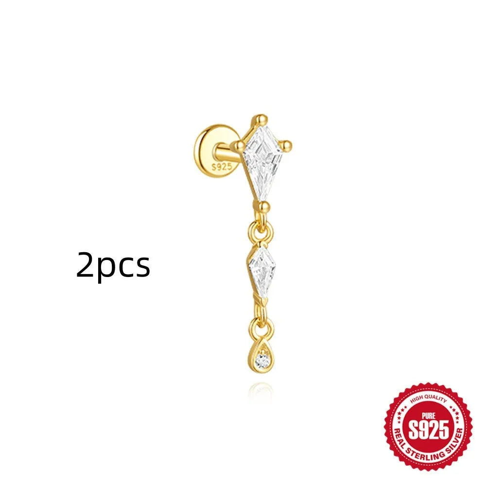 Geometric kite-shaped sterling silver earrings with a gold electroplated chain tassel featuring rhinestones.