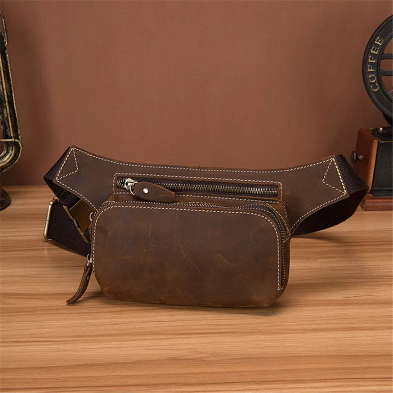Brown top layer cowhide men's sports waist bag with zipped closure shown from front