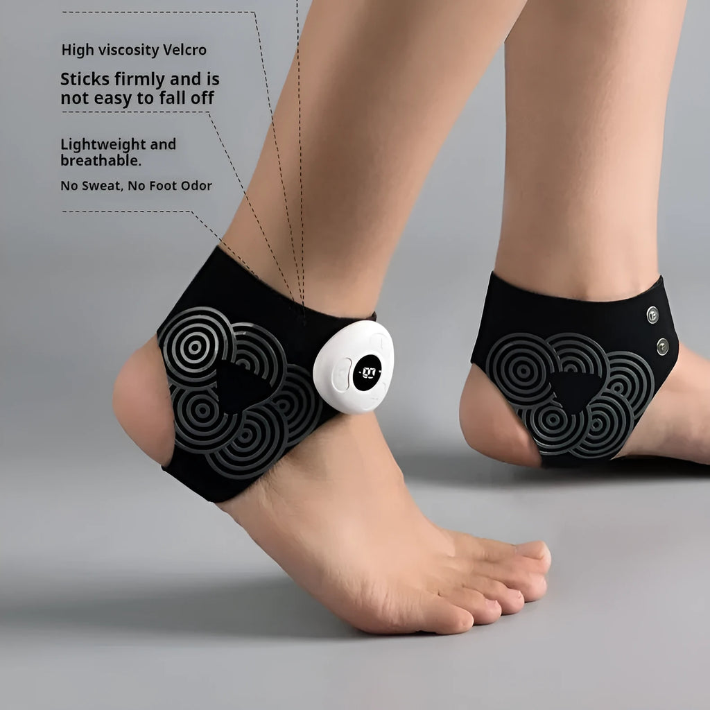 Black sports anti-odor foot massager with adjustable ankle strap and spray bottle on a table