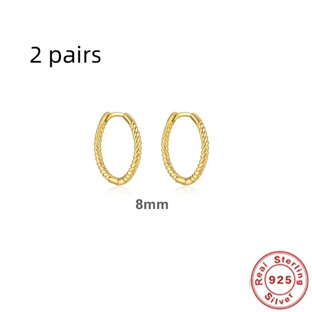 Sterling silver twisted ring earrings in geometric round design with gold or platinum finish