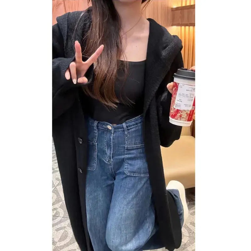 Korean style long hooded knitted cardigan coat for women in a loose free size.
