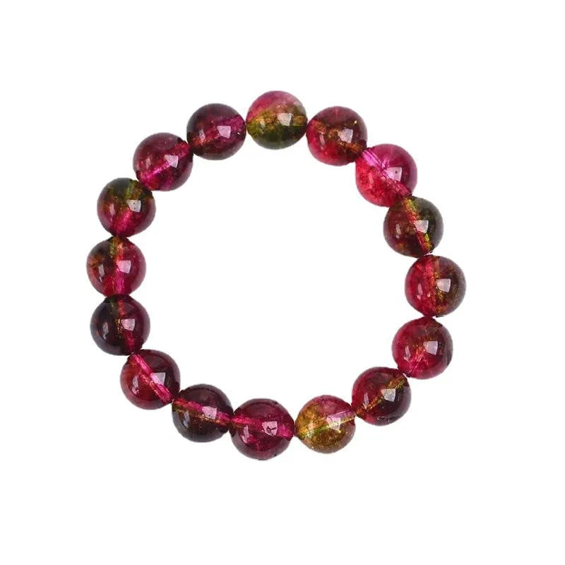 Handmade watermelon red crystal bracelet for women, shown in a casual style with pastoral elements.