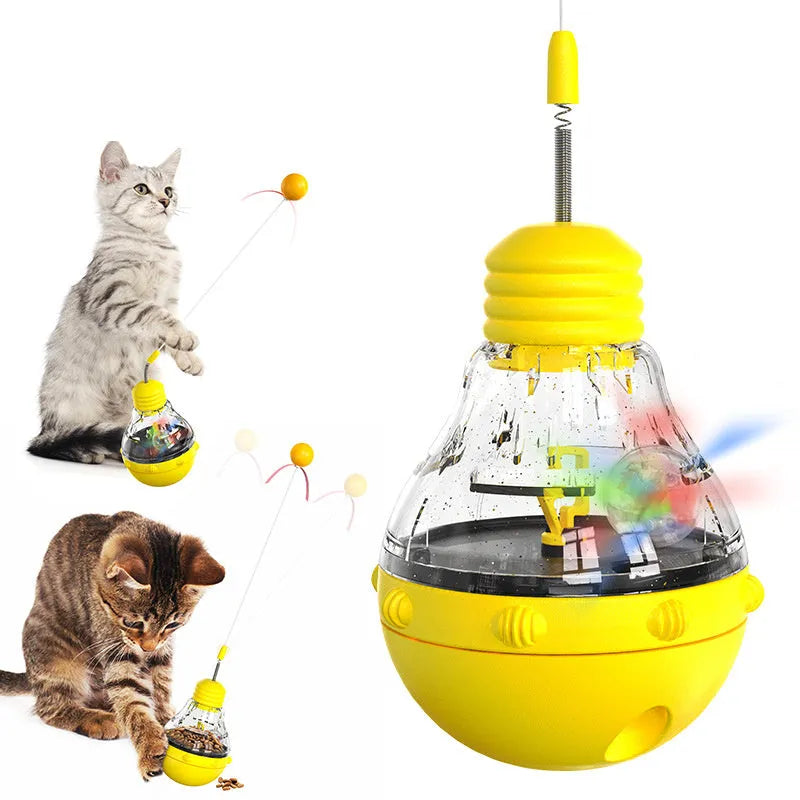 Multi-colour cat interactive toy with rocking base, slow feeder compartment, and bouncing teaser wand with plastic ball attachment