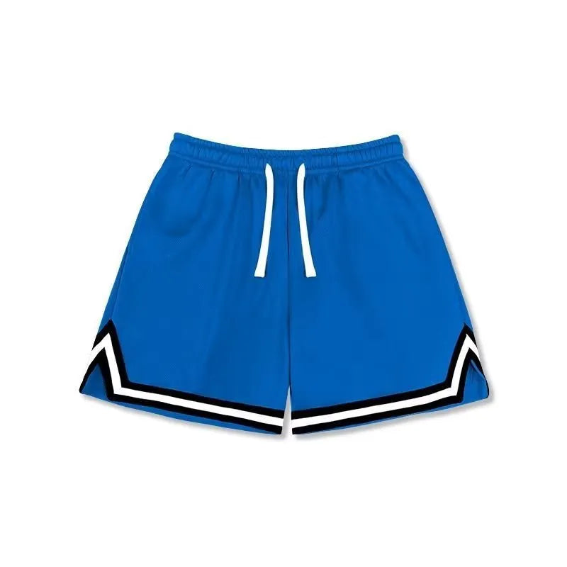 Man wearing loose grey sports shorts made from elastic polyester fabric.