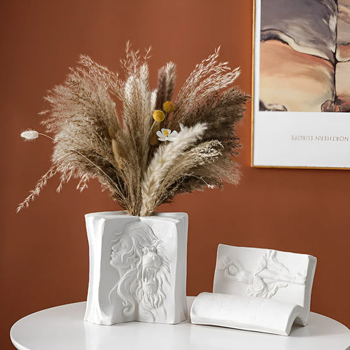 Glazed ceramic book stand ornament in a modern style on a desktop, shown in one of four design options.