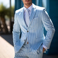 Blue and white button British style men's suit jacket with straight hem and seam pockets.