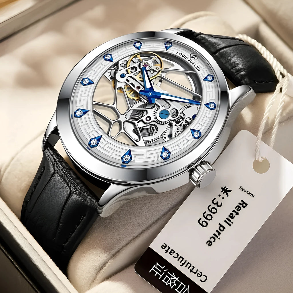 Men's silver case mechanical watch with black leather strap, white face, blue hands, and business styling
