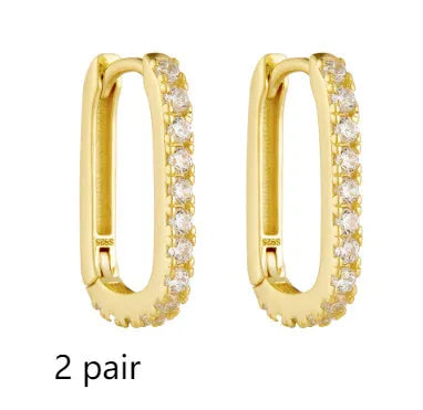 Sterling silver oval zircon ear clips with geometric quadrilateral settings
