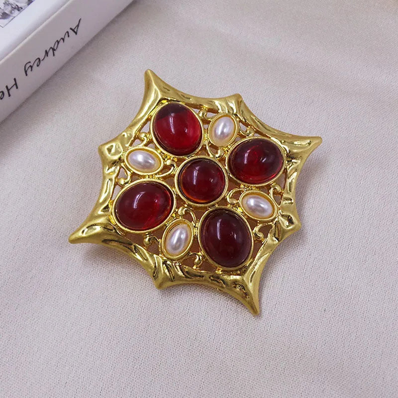Close-up of a vintage zinc alloy baroque cross brooch with crystals, showing one of eight available colour styles.