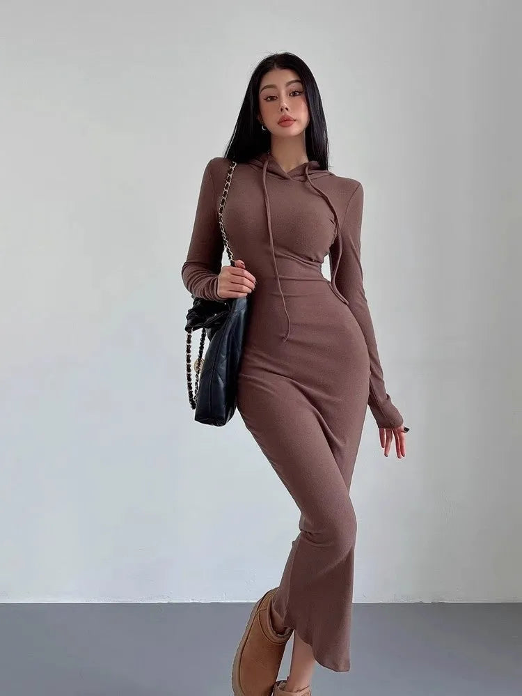 Women's long sleeve hooded sheath dress in grey with over-the-knee length and high waist.