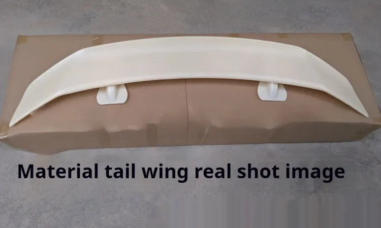 Universal punch-free car spoiler in ABS plastic with adhesive mounting