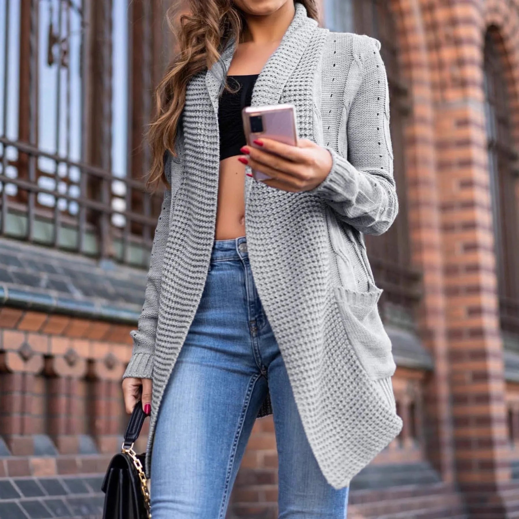Grey women's loose cardigan coat with patch pockets and long sleeves