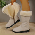 Fleece-lined mid-calf snow boots in black, with waterproof platform sole and round toe