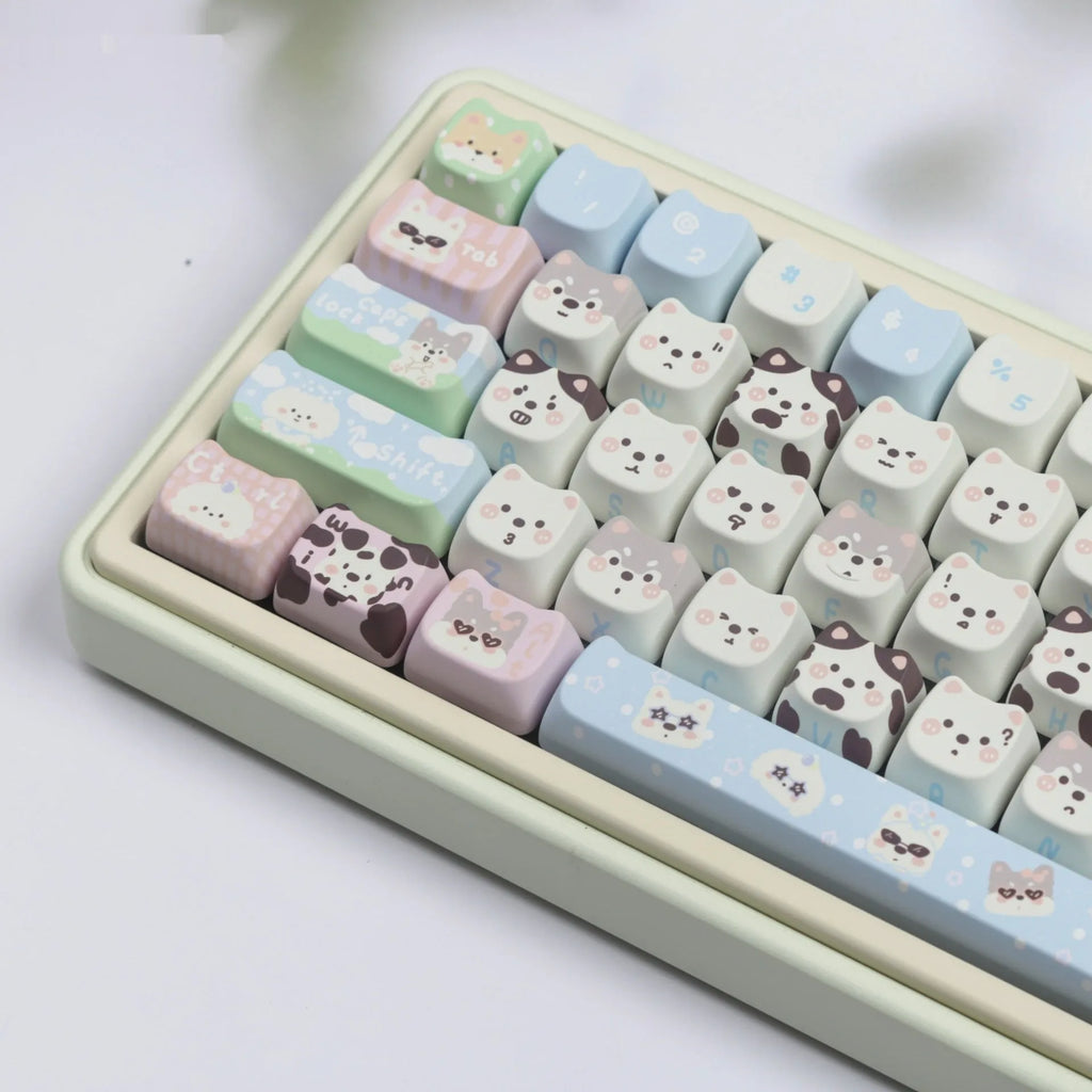 Colourful cat and puppy themed PBT key cap set for mechanical keyboards with cartoon animal artwork