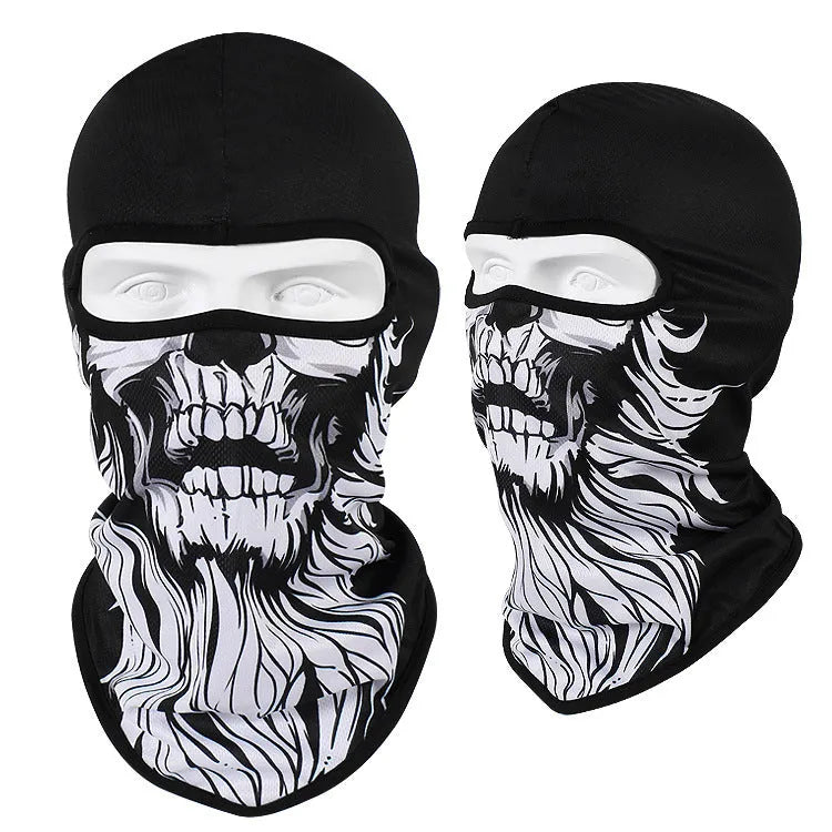 Breathable Bakool silk motorcycle skull mask in a graphic design, laid flat showing its 36cm by 29cm size.