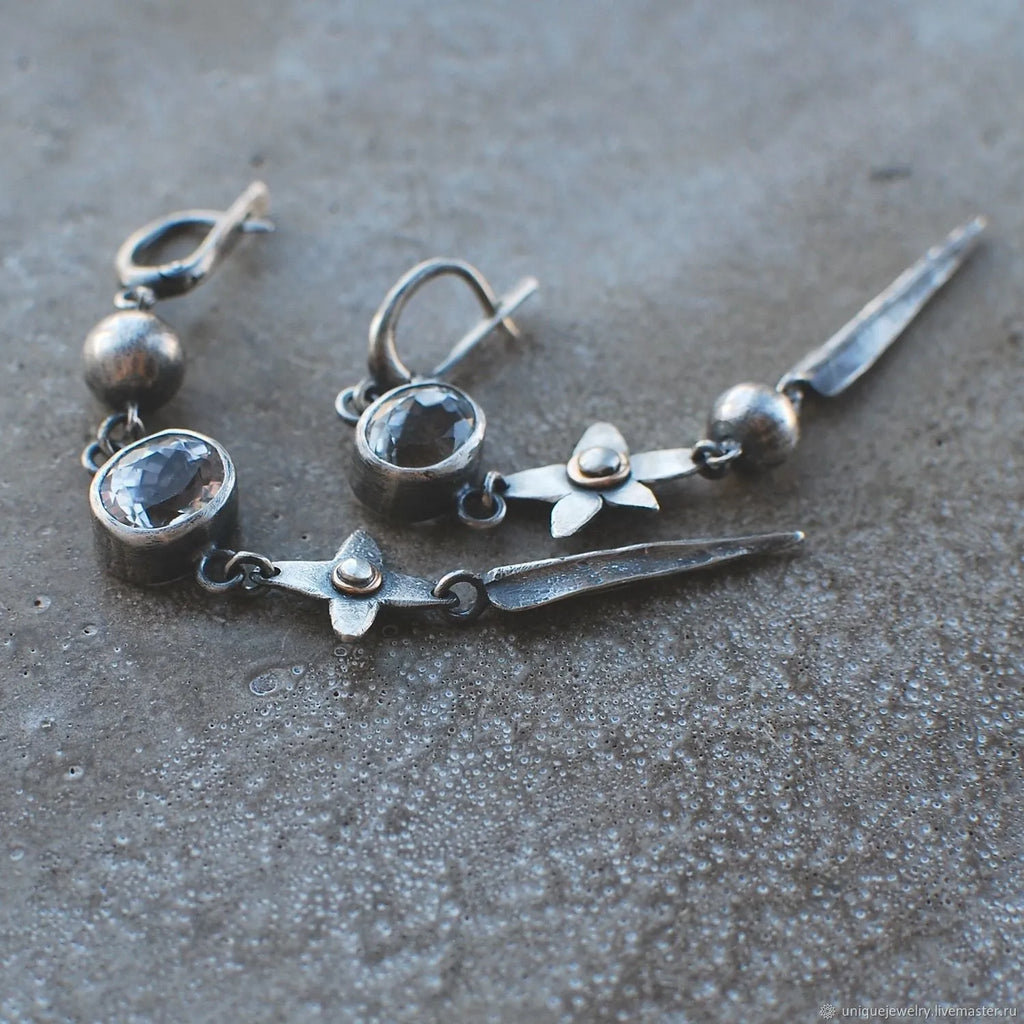 Geometric antique silver earrings with long rhinestone pendants and XINGX design