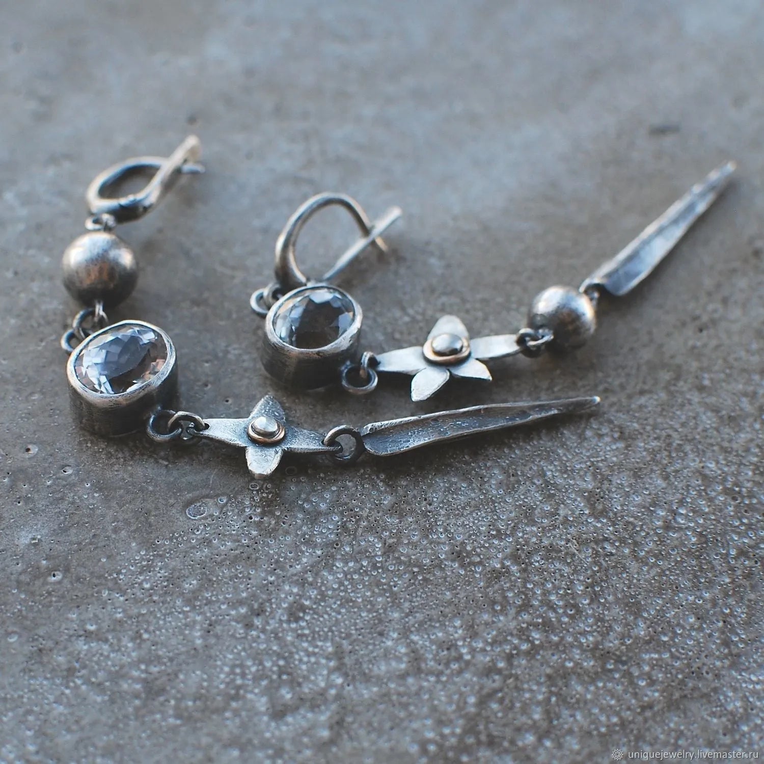 Geometric antique silver earrings with long rhinestone pendants and XINGX design