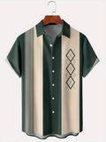 Men's loose plaid short-sleeve shirt with lapel collar on a hanger
