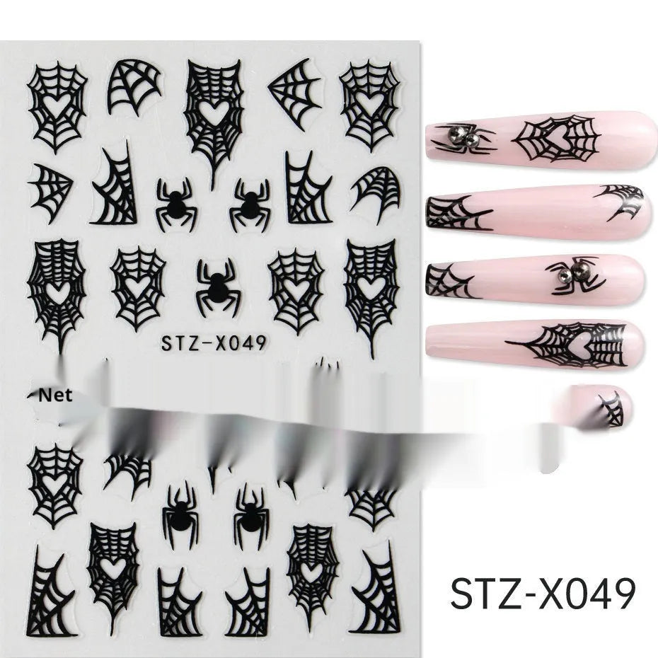Sheet of black and silver love heart pattern nail art stickers with a plastic nail patch.