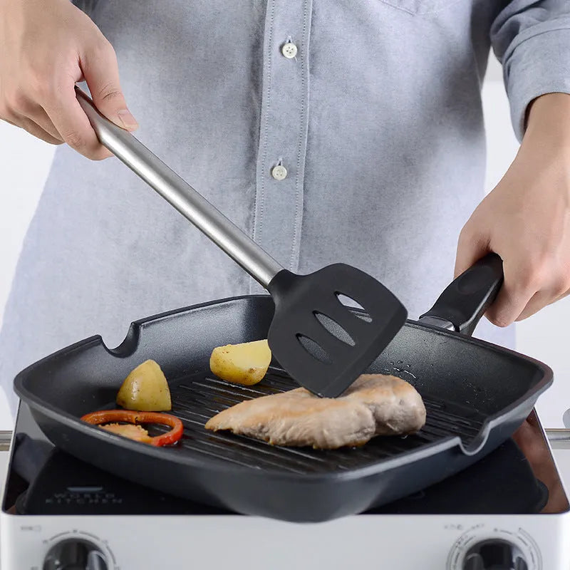 Black silicone cooking spatula and spoon set with stainless steel handles containing 16 kitchen utensils