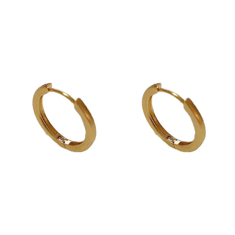 Circular geometric copper ear clips for women with gold or silver finish