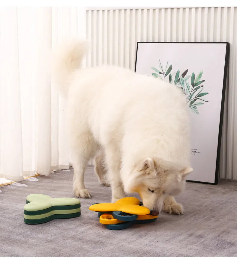 Green and yellow dog puzzle toy slow feeder with 9 compartments and bone-shaped covers