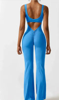 Women's black milk silk yoga bodysuit with seamless design and mid waist.