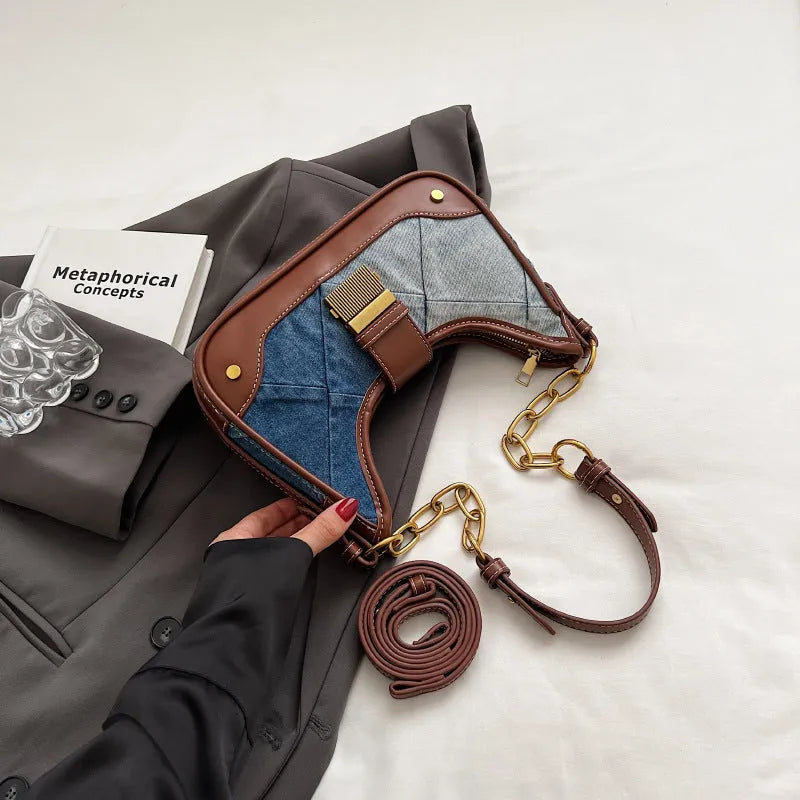Brown denim women's shoulder bag with chain detailing and bucket shape design