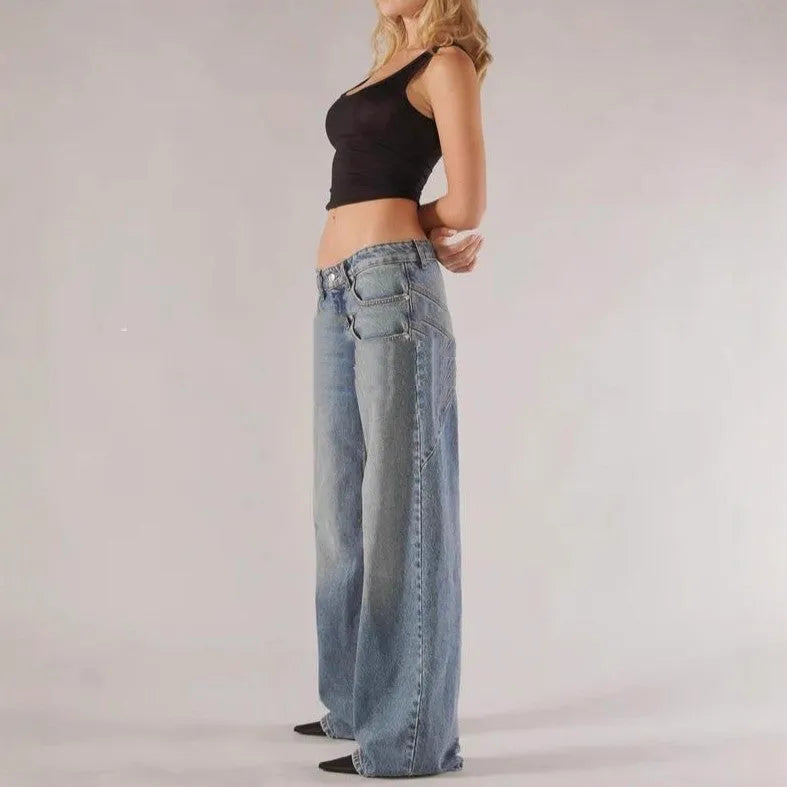 Women's loose fit cotton wide leg mop trousers in blue, showing low waist and straight leg design.