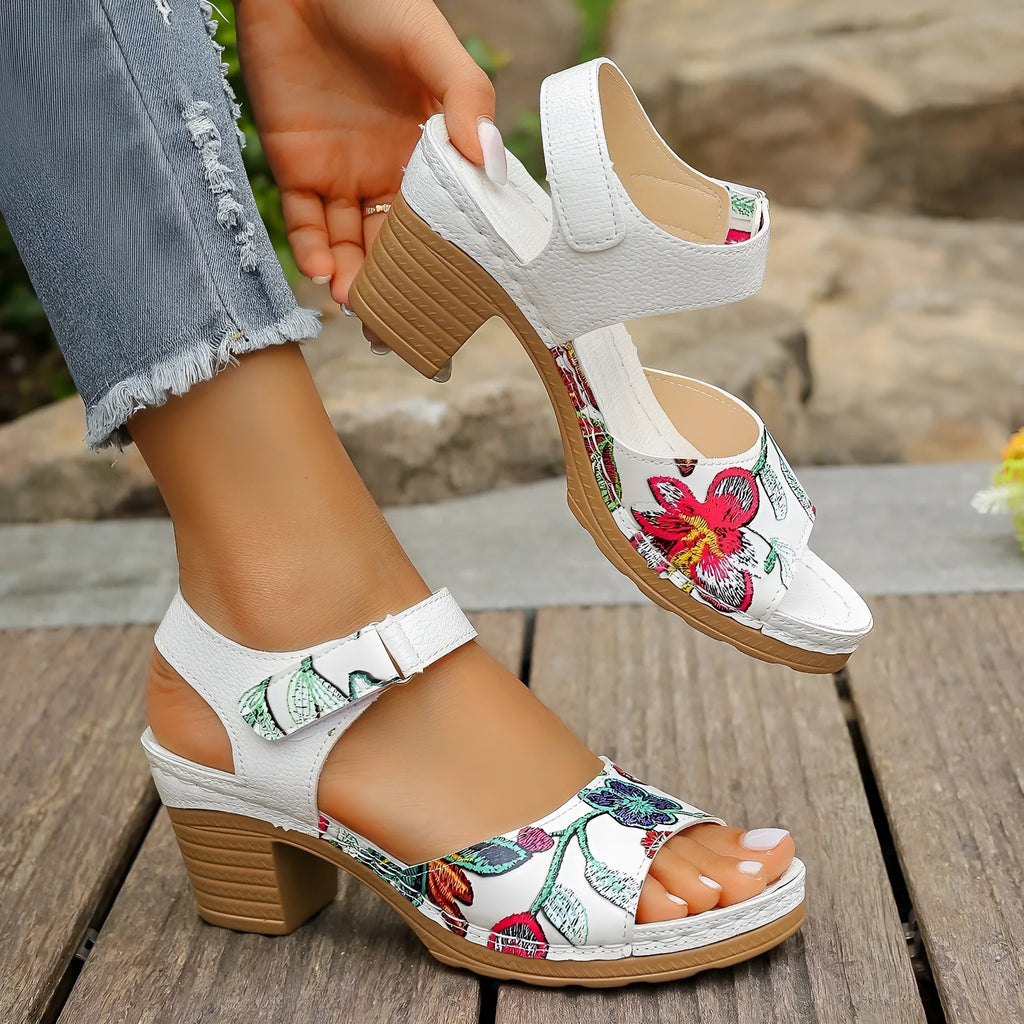White women's high heel sandals with velcro buckle strap and rubber sole