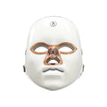 Rechargeable manual touch LED beauty mask in white golden edge colour with adjustable strap.