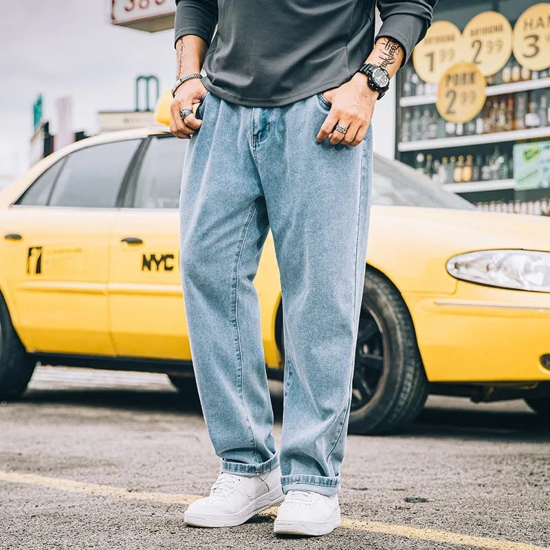 Men's loose straight casual jeans in dark blue, light blue and grey colours with mid waist design