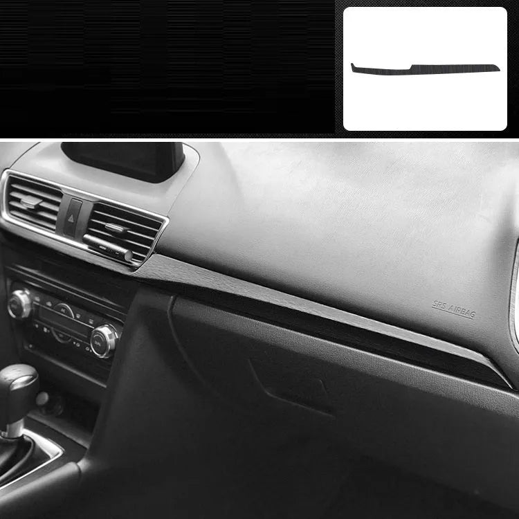 Car interior decorative vinyl sticker kit showing pre-cut pieces for dashboard, centre console and trim