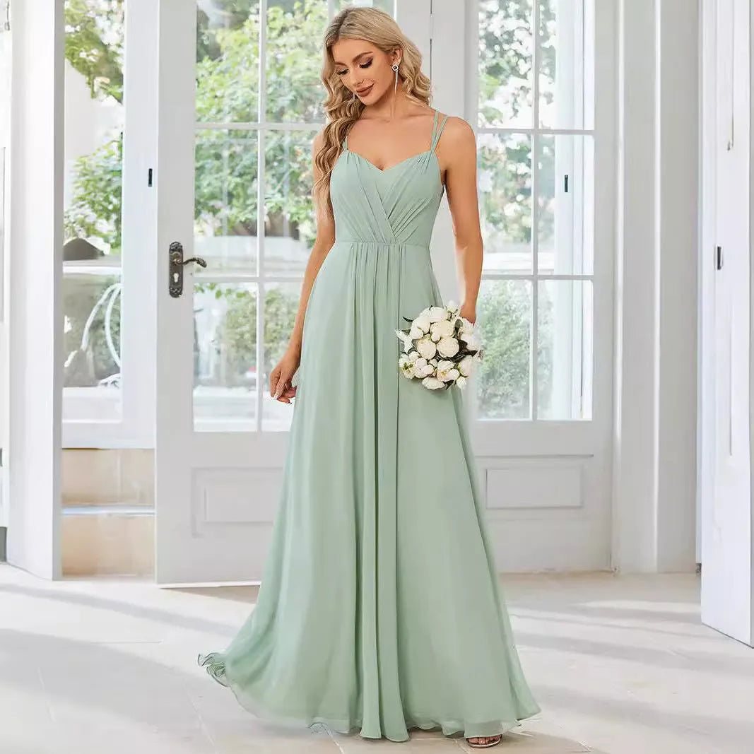 Women's sleeveless long A-line pleated dress in solid colour polyester fabric