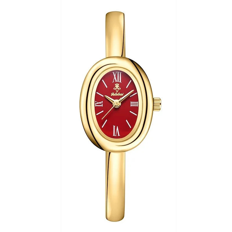 Women's oval retro quartz watch with 8mm thickness showing gold and silver colour options with spiral patterns
