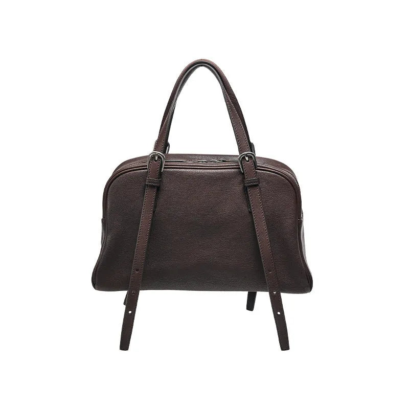 Women's genuine leather retro shoulder bag showing horizontal square design with double straps in black colour option.