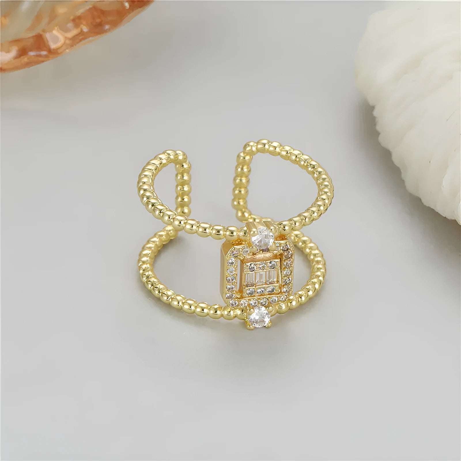 High Sense adjustable open ring with asymmetric U-shaped design in gold colour