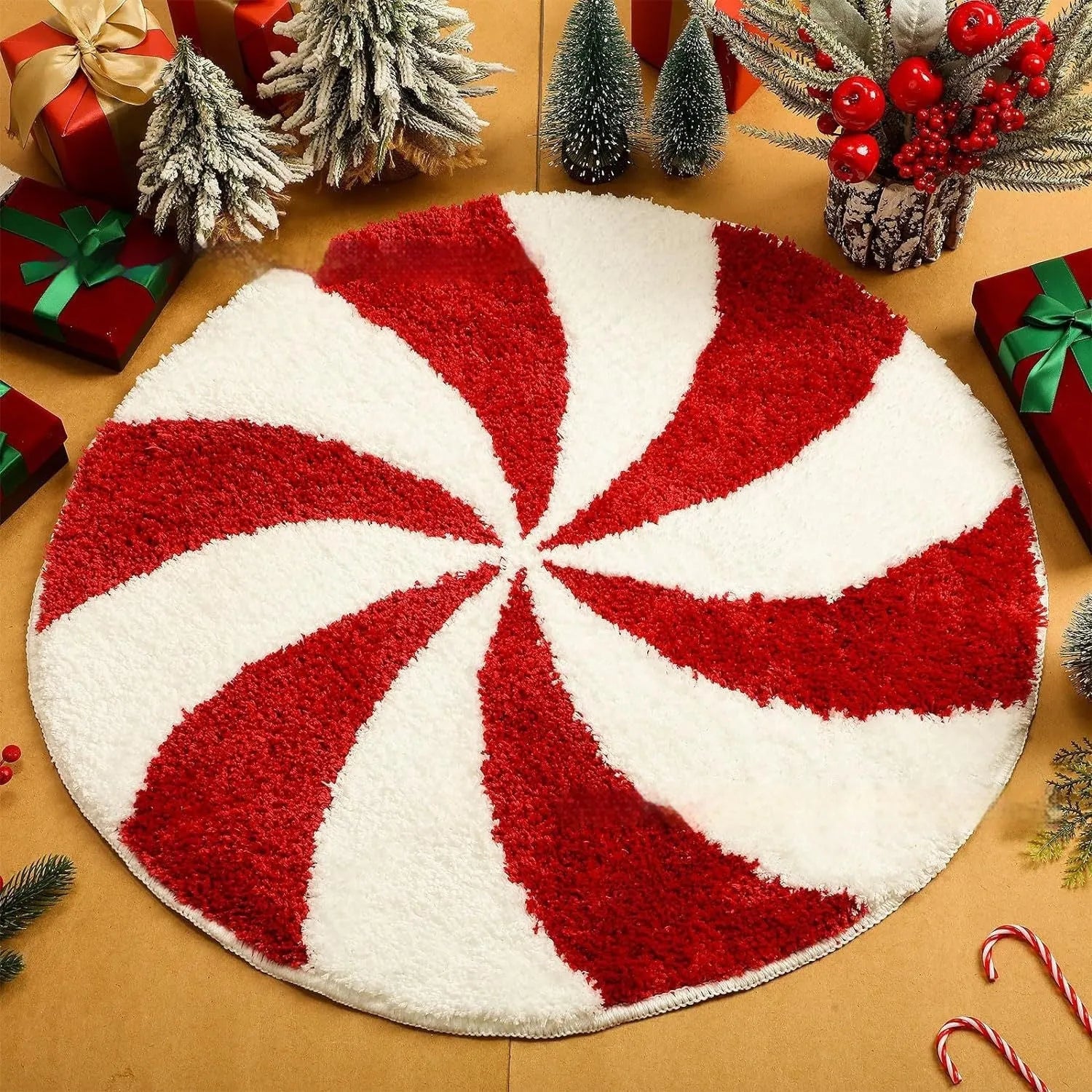 Round Christmas carpet with printed festive design in polyester fibre available in 60cm and 80cm sizes