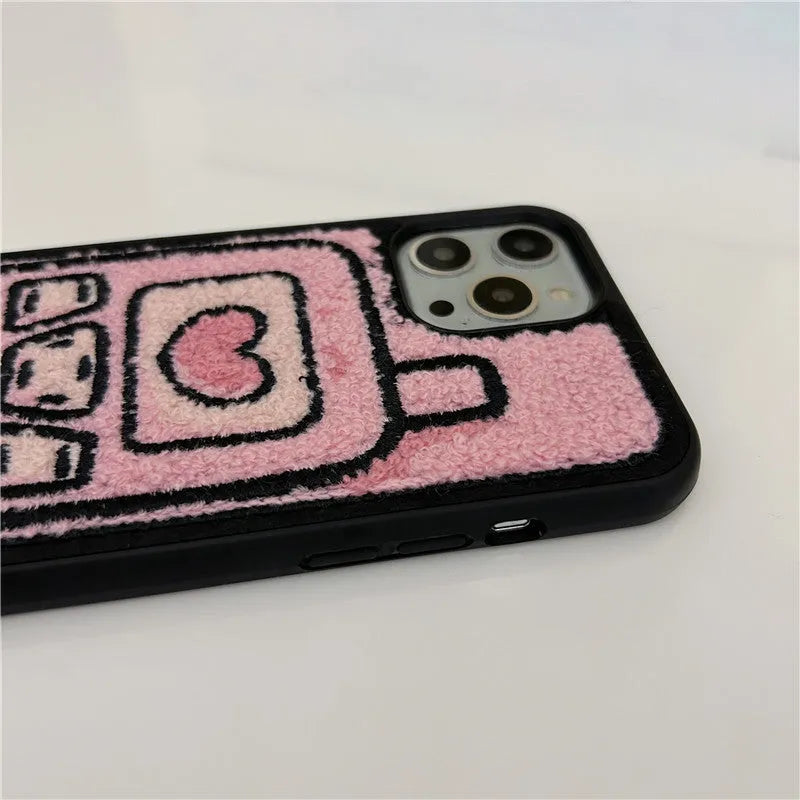 Pink TPU iPhone back case with a unique towel embroidery texture on the rear.