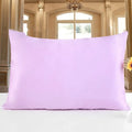 Double-sided silk pillowcase showing reversible design in apricot colour with three size options displayed