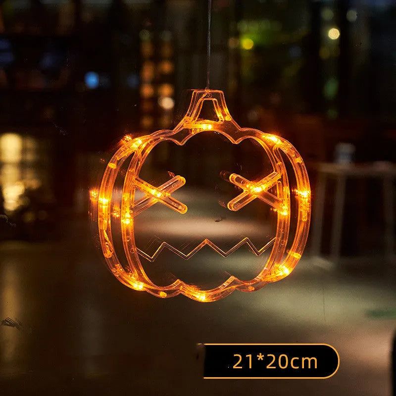 Halloween window hanging LED lights with suction cups showing multiple horror-themed designs powered by batteries